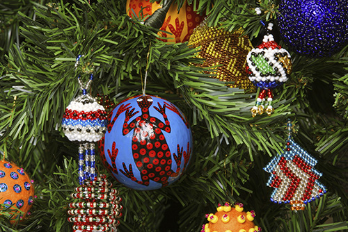 Close up of colorful bulbs in christmas tree